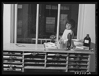 Little Mexican girl in diptheria ward at the county hospital. San Diego, California by Russell Lee