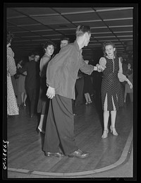 Dancers at large dance hall in San Diego, California by Russell Lee
