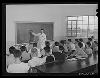 Instructor and class at the vocational school for aircraft construction workers. San Diego, California by Russell Lee