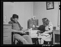 Family at FSA (Farm Security Administration) camp. Caldwell, Idaho by Russell Lee