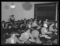 [Untitled photo, possibly related to: Class in machine education at the San Diego Vocational School. There are forty to fifty machines constantly in operation in this class. San Diego, California] by Russell Lee