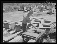 Making irrigation tile. Canyon County, Idaho. Practically all agriculture depends upon irrigation in this county by Russell Lee