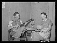 Farm worker and his wife in their cottage home at the FSA (Farm Security Administration) labor camp. Caldwell, Idaho by Russell Lee