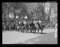 Starting line of the kids' horse race at the Fourth of July celebration. Vale, Oregon. This was a farm boys race. "No ringers, no professionals allowed" was the rule by Russell Lee