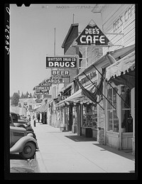 Street scene. Cascade, Idaho. Cascade is a microcosm of Idaho's past and present--all the industries of the state, including lumbering, mining, agriculture, stock raising and tourist trade are apportioned to this town and its valley by Russell Lee