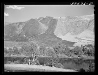 [Untitled photo, possibly related to: Mountains in Gem County, Idaho. The darker part is the burned-over grass land. The summers are dry in this section and the fire hazard is high] by Russell Lee