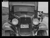 Truck of a group of thirty-five migrant workers leaving North Carolina for Easton, Maryland, to pick beans. Sourced from the Library of Congress.