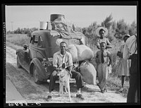 [Untitled photo, possibly related to: Group of Florida migrants on their way to Cranberry, New Jersey, to pick potatoes. Near Shawboro, North Carolina]. Sourced from the Library of Congress.