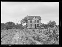 The house and home garden of William Sanders,  farmer, who has just begun receiving FSA (Farm Security Administration) aid. Saint Inigoes, Maryland. Sourced from the Library of Congress.