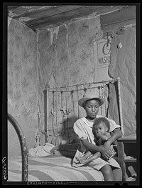 Two of the eleven children of Edward Gont, one of the newer FSA (Farm Security Administration) clients, who still has a great deal of improving to do. Dameron, Maryland. Sourced from the Library of Congress.