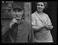 Mr. and Mrs. Ben Harris. They come from Luzerne County Pennsylvania. Have goats, and sell goats milk. Do hardly any farming. Live in the submarginal farm area of Rumsey Hill, near Erin, New York. Sourced from the Library of Congress.
