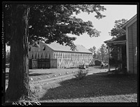 Tobacco barn on the farm of Mrs. Mary Smith, Polish-American tobacco farmer. Near Thompsonville, Connecticut. Sourced from the Library of Congress.