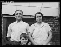 FSA (Farm Security Administration) client Gaetano Simone, his wife, and one of their children. Westville, Connecticut. Sourced from the Library of Congress.