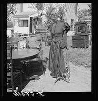 Furniture and old dress model auctioned off at the auction of Mr. Anthony Yacek's farm and household goods. Derby, Connecticut. Sourced from the Library of Congress.