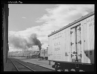 At the railroad terminal of the Bangor and Aroostook Railroad in Caribou, Maine. Sourced from the Library of Congress.