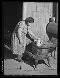 Mrs. Dagle, French-Canadian, whose husband runs a small potato farm in Fort Kent, Maine. (FSA-Farm Security Administration). Sourced from the Library of Congress.