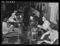 Workers in the small ladies coat factory in Colchester, Connecticut (Levine & Levine ladies coats). Most of the workers live on farms nearby. Sourced from the Library of Congress.
