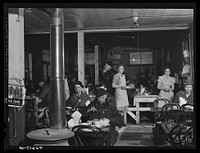 The Star Lunch, just outside the shipyard at Bath, Maine. About two hundred men come in for lunch every day. The owner had to build an addition to the restaurant to make room for all the men during lunch hour rush. Sourced from the Library of Congress.