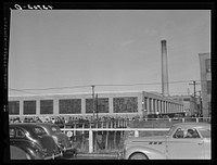 [Untitled photo, possibly related to: Men leaving the Browne and Sharpe Manufacturing Company in Providence, Rhode Island at the end of the shift]. Sourced from the Library of Congress.