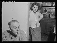 [Untitled photo, possibly related to: Mr. Manuel Lameida, Portuguese FSA (Farm Security Administration) client in Tiverton, Rhode Island. He comes from Saint Michael Island, Portugal. Now runs a small truck farm. Shown with him is his daughter]. Sourced from the Library of Congress.