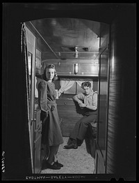 Mr. and Mrs. Leslie Bryant in their trailer about two miles out of Bath. Mr. Leslie Bryant works in the shipyard. They have been living in the trailer for two months. They could not rent in Bath and although a trailer cost them almost as much as a house, Mr. Bryant feels that it is a better investment because they do not know where they will go next in search of work when this "boom" is over. Bath, Maine. Sourced from the Library of Congress.