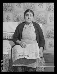 Armenian woman living on a five-and-a-half acre vegetable farm which she runs with her son-in-law and his family. They have to rely on any outside work they can get to live thru the winter. West Andover, Massachusetts. Sourced from the Library of Congress.