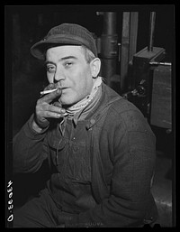 Italian metal worker at the Correct Manufacturing Company in Fallston Pennsylvania. Sourced from the Library of Congress.
