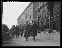 [Untitled photo, possibly related to: Employees coming out of a textile mill in Lawrence, Massachusetts]. Sourced from the Library of Congress.