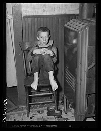 Son of a Pittsburgh Crucible steelworker in Midland, Pennsylvania. Father is at present in bed as a result of a leg injury at the plant. There are seven children all told. They sell magazines from door to door to help out at home. Sourced from the Library of Congress.
