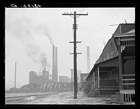 [Untitled photo, possibly related to: Scene in west Aliquippa, Pennsylvania. Stacks of the Jones and Laughlin Steel Corporation in background]. Sourced from the Library of Congress.