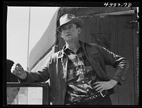 [Untitled photo, possibly related to: Man from Idaho, who got temporary work at Fort Bragg, now plans to go back home. In a trailer settlement near Fayetteville, North Carolina]. Sourced from the Library of Congress.