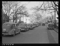 [Untitled photo, possibly related to: A street in Fayetteville, North Carolina about 4:30 p.m. when workers are coming out of Fort Bragg, North Carolina]. Sourced from the Library of Congress.