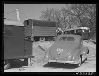 [Untitled photo, possibly related to: In a trailer settlement of workers from Fort Bragg. Manchester, North Carolina. The closest trailer is occupied by workers who came from Idaho]. Sourced from the Library of Congress.
