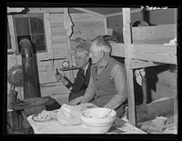 Migratory workers who work at Fort Bragg in bunkhouse where several of them live near Spartanburg, South Carolina. Sourced from the Library of Congress.