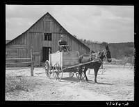 [Untitled photo, possibly related to: Tenant farmer moving the last of his load out of his farmer home in Camp Croft area. Near Whitestone, South Carolina]. Sourced from the Library of Congress.