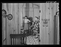The Edwards family in their prefabricated home at the Hazlehurst Farms Inc., Hazlehurst, Georgia. They owned a farm in Willie, Georgia in the Hinesville Army camp area. Sourced from the Library of Congress.