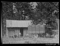 [Untitled photo, possibly related to:  family moving out of Camp Croft area collecting some belongings from a relative. Near Spartanburg, South Carolina region]. Sourced from the Library of Congress.