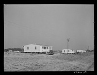 [Untitled photo, possibly related to: Completed prefabricated houses at Pacolet, South Carolina for farmers who have had to move out of the Camp Croft Army camp area]. Sourced from the Library of Congress.