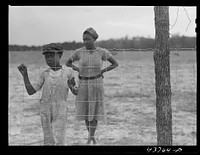 [Untitled photo, possibly related to: Two of the  people who have been moved out of the Camp Stewart area near Hinesville to Hazlehurst Farms. Hazlehurst, Georgia]. Sourced from the Library of Congress.