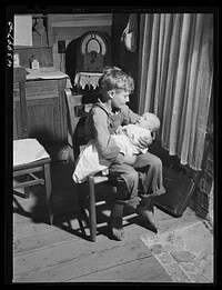 Colie Smith with the eighth member of the Smith family. Carroll County, Georgia (see general caption). Sourced from the Library of Congress.