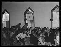 At a meeting of  FSA (Farm Security Administration) borrowers in a church near Woodville. Greene County, Georgia. Sourced from the Library of Congress.