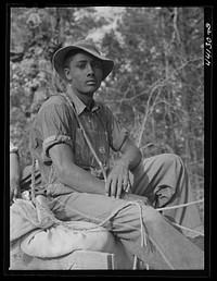 [Untitled photo, possibly related to: Mr. Frank Barnett and his son.  farmer near Scull Shoals who is part Cherokee Indian. Greene County, Georgia]. Sourced from the Library of Congress.