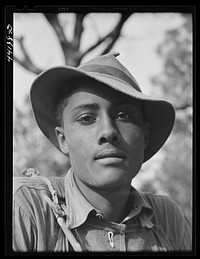 [Untitled photo, possibly related to: Mr. Frank Barnett and his son.  farmer near Scull Shoals who is part Cherokee Indian. Greene County, Georgia]. Sourced from the Library of Congress.