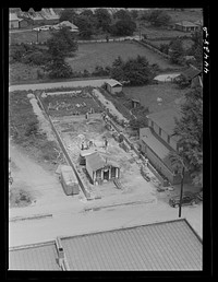 Store being built on the main street of Childersburg, Alabama. Sourced from the Library of Congress.