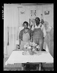 [Untitled photo, possibly related to: In the home of a FSA (Farm Security Administration) family. Greene County, Georgia]. Sourced from the Library of Congress.