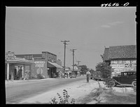 [Untitled photo, possibly related to: Main street of Siloam, Greene County, Georgia]. Sourced from the Library of Congress.