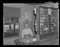 The postmaster in Upper Zion, a small town that will be evacuated to make room for the Army maneuver grounds. Caroline County, Virginia. Sourced from the Library of Congress.