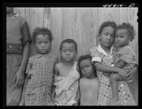 Some of the children of a family of ten who must move out of the area being taken over by the Army in Caroline County, Virginia. Sourced from the Library of Congress.
