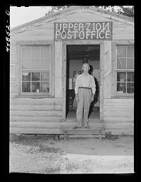The postmaster of Upper Zion, Virginia. When the town is evacuated to make room for the Army maneuver grounds, he will be out of a job. Sourced from the Library of Congress.