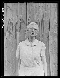 [Untitled photo, possibly related to: Mrs. Carrie Ward has lived near Leraysville for seventeen years. Now she is planning to move out of the Army camp area to a small farm in Sandy Creek. Her barn is numbered for auctioning. Leraysville, New York]. Sourced from the Library of Congress.